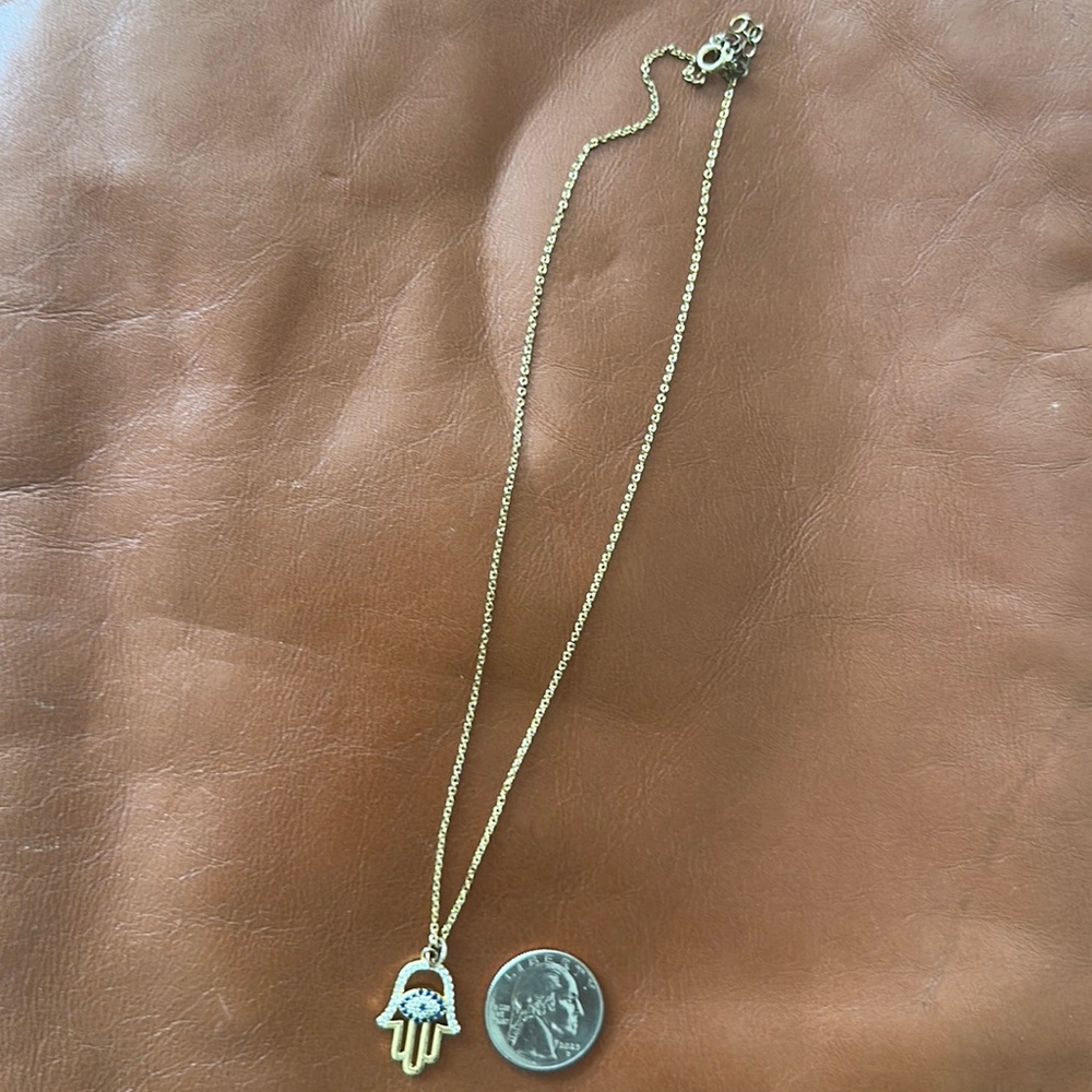 Unique evil eye/hand pendant